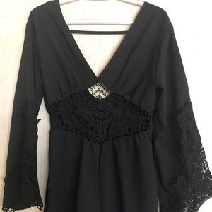 Black bell sleeves romper never worn